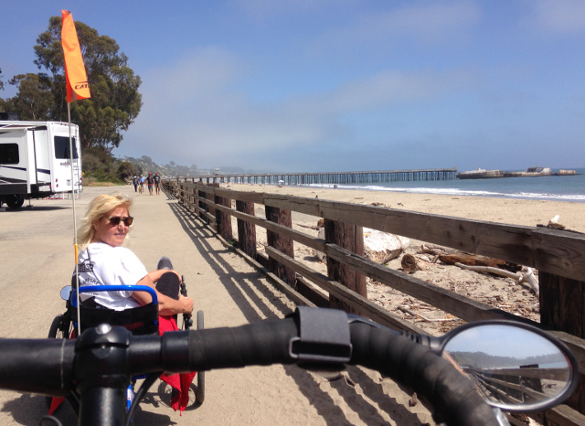 Julie on trike on Seacliff boardwalk, California