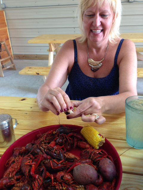 Julie eating crawdads in Porter, Texas